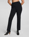 Black pants worn by a person on a plain background