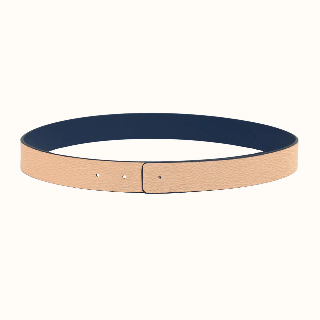 Navy belt with beige buckle on a white background