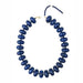 navy chunky beaded necklace with gold clasp on white background