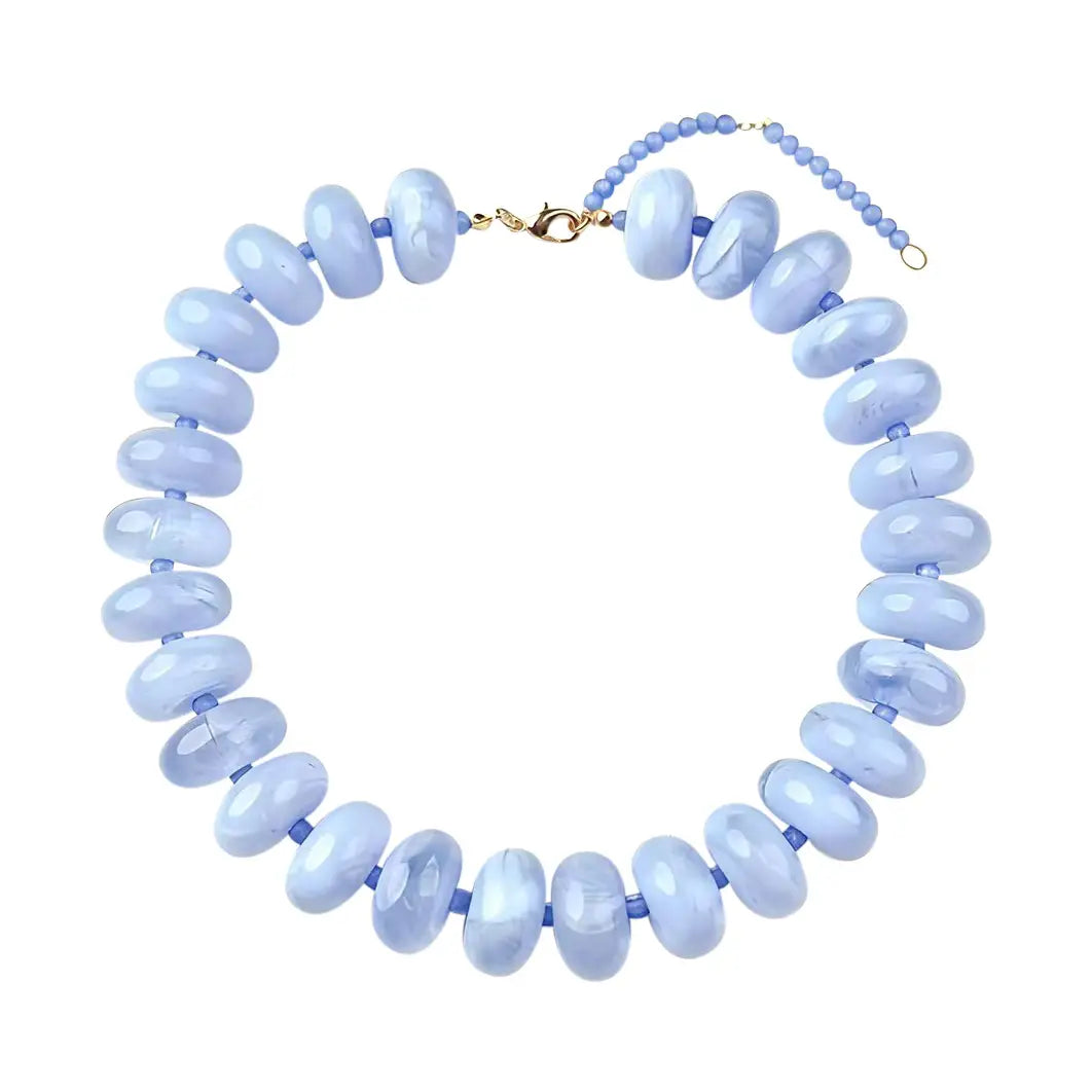 light blue chunky beaded necklace with gold clasp on white background