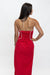 A woman shown from the back wearing a bright red strapless dress with white piping and a thin white tie detail at the neckline, against a plain white studio background.