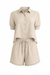 Beige striped shirt and shorts set on a white background