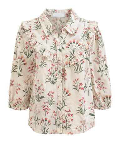 Floral blouse with ruffled collar on a white background