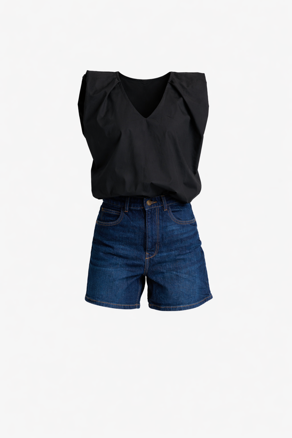 Black sleeveless top and blue denim shorts on a white background