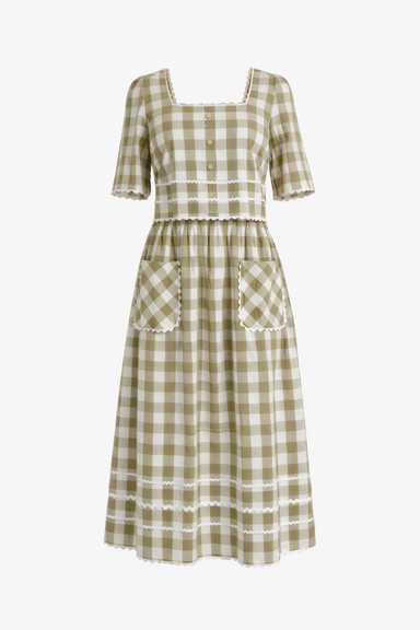 Green and white checkered dress with lace details on a white background