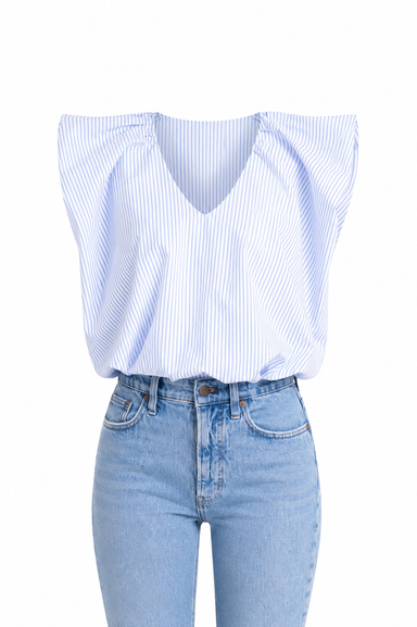 Blue and white striped top with high-waisted jeans on a white background