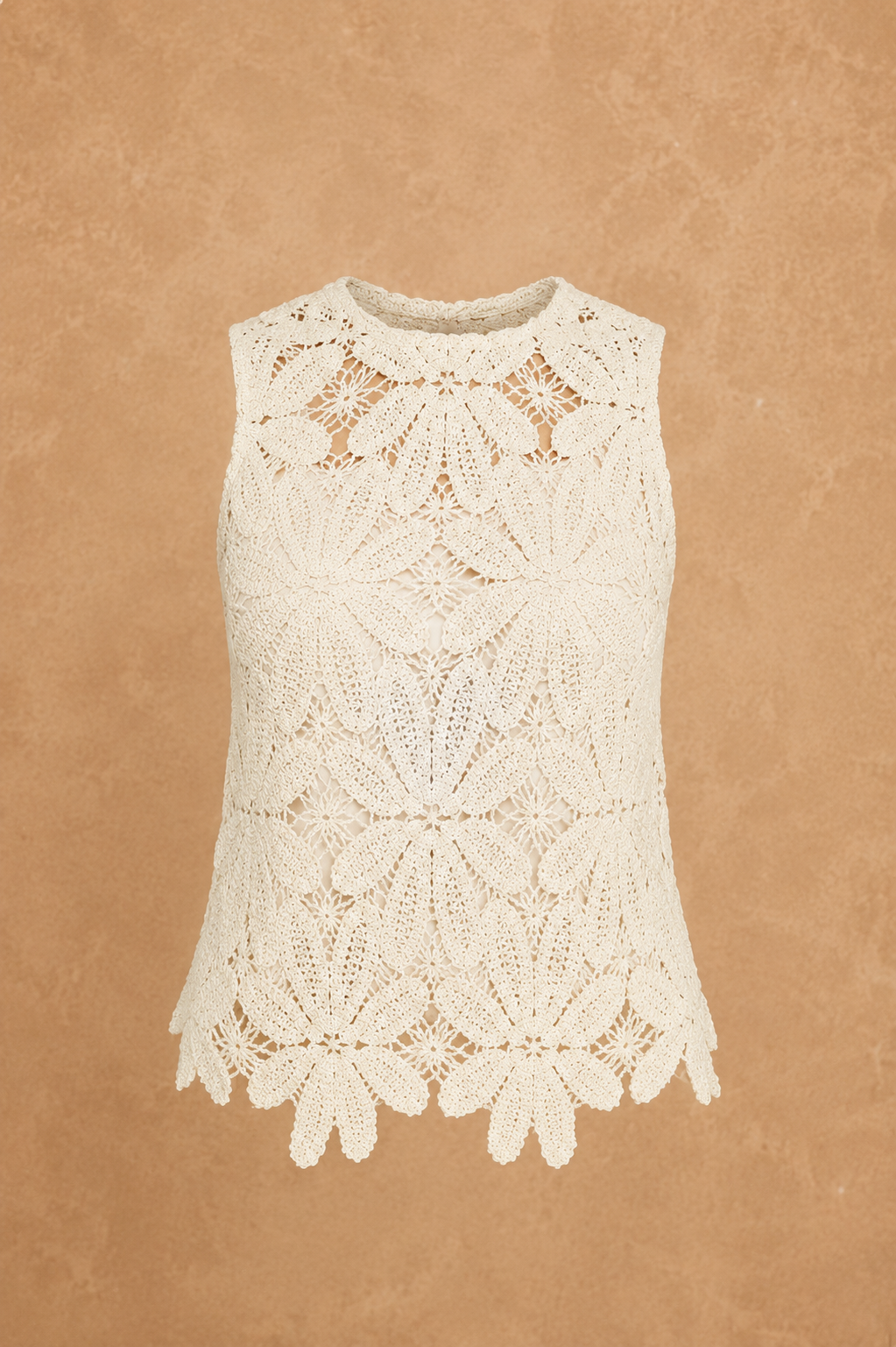 White crochet top on a beige background