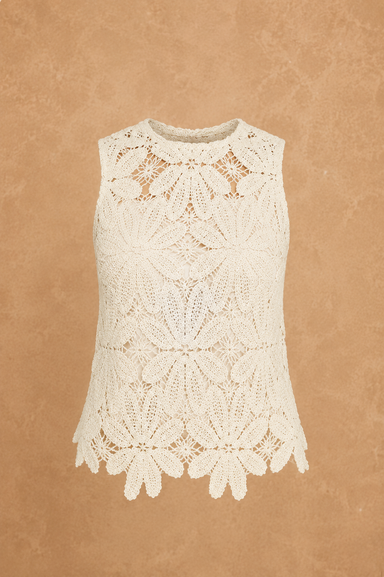 White crochet top on a beige background
