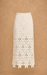 crochet skirt on a brown background