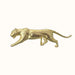 Gold panther figurine on a white background