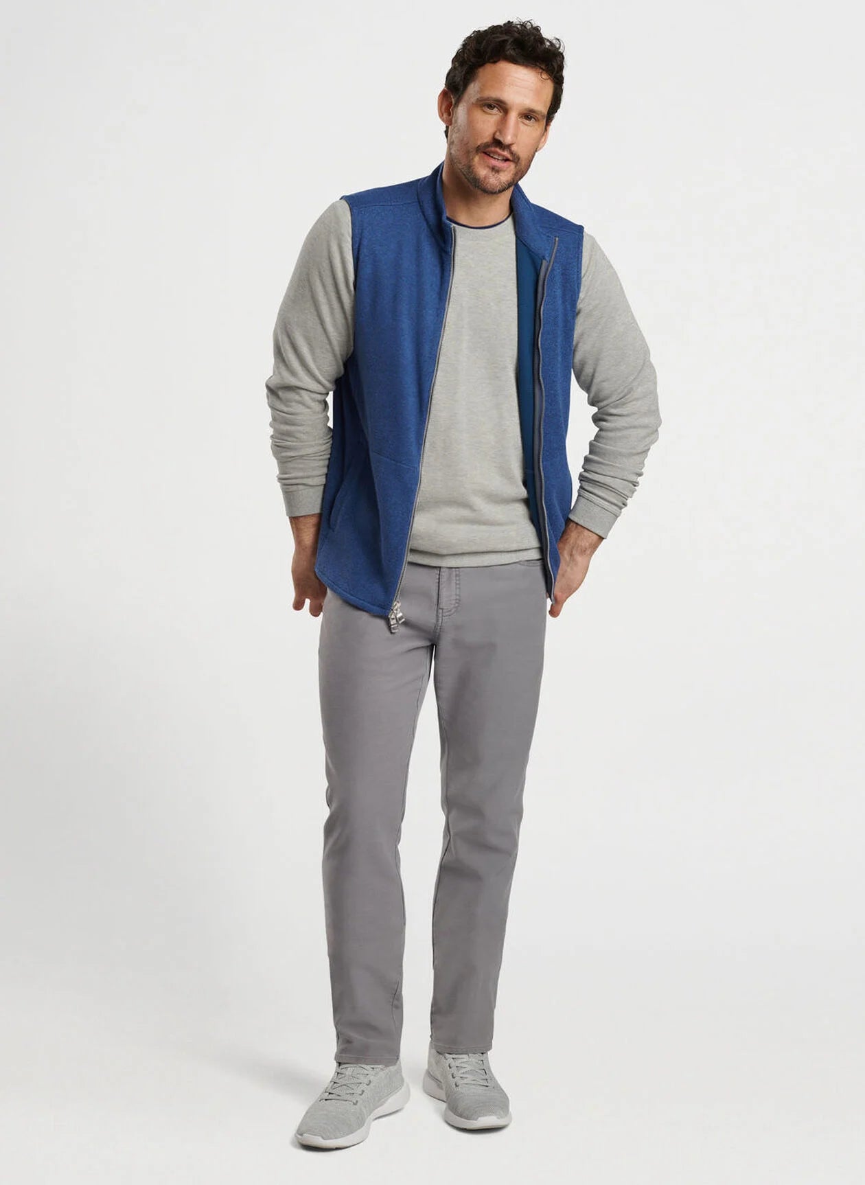 fleece vest over dress shirt How the Fleece Vest Became the New Corporate Uniform