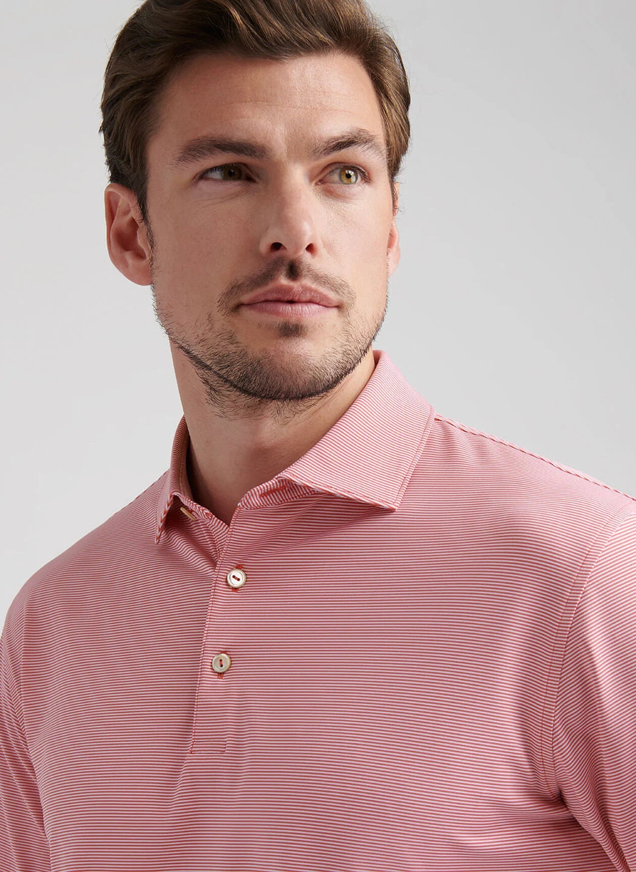Jubilee Performance Jersey Polo by Peter Millar - Tango Pink