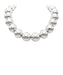 Silver beaded necklace on a white background