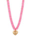 Necklace with pink beads and a gold heart pendant on a white background