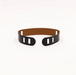 Black belt with brown interior on a white background