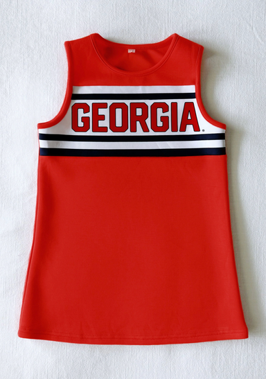 A red sleeveless athletic top with 'GEORGIA' printed across the chest in red letters outlined in white, set against white and black horizontal stripes.