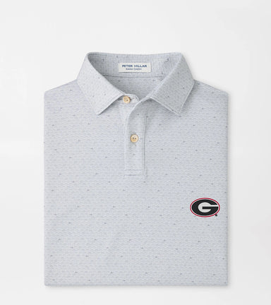 A light gray micro-patterned polo shirt by Peter Millar, featuring a small embroidered Georgia Bulldogs logo on the left chest, presented on a clean white background.