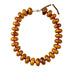 tortoise chunky beaded necklace with gold clasp on white background
