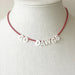 Necklace with 'GO DAWGS' on a mannequin bust